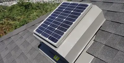 attic fan installation services with energy-efficient roof-mounted ventilation system in Bloomington, IN