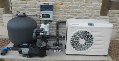 electric heater installation services with connected outdoor heating system equipment in Bloomington, IN