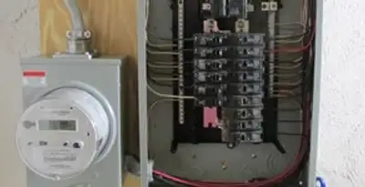 electrical panel upgrade service showing outdated electrical panel prepared for professional replacement in Bloomington, IN