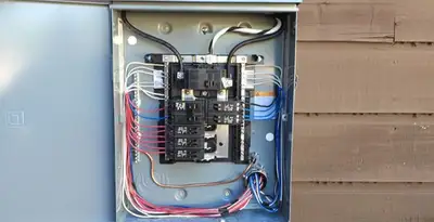 electrical panel upgrade service featuring newly installed electrical panel wired by licensed electricians in Bloomington, IN