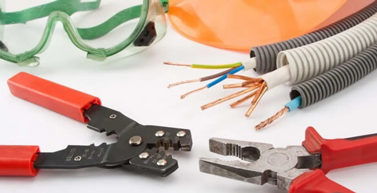 Electrical wiring repair with professional tools and safety equipment in Spencer, IN