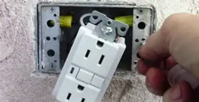 gfci circuits service showing installation of a ground fault circuit interrupter outlet by licensed electricians in Bloomington, IN