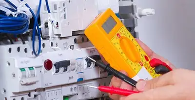 Residential electrician testing home electrical panel for safety and performance in Bloomington, IN