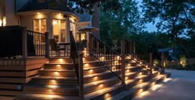 Residential electrician installing outdoor lighting for home safety in Bloomington, IN