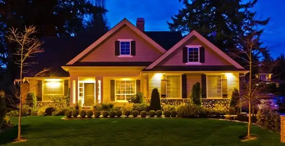 security light installation services illuminating a residential exterior at night in Bloomington, IN
